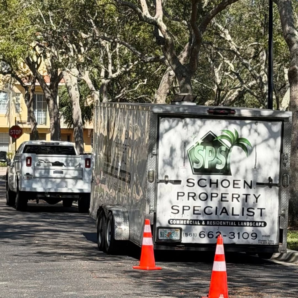 Schoen Property Specialist branded SPS trailer and truck on site for commercial landscape service